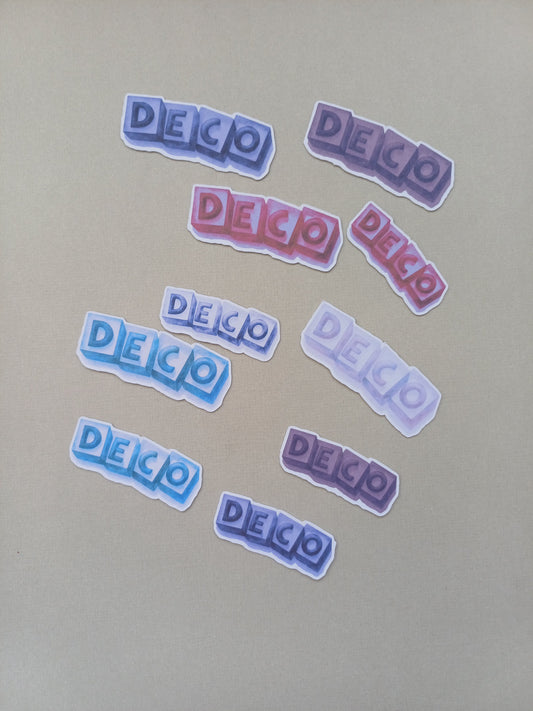 DECO tekstileike. kuutioiden päällä kirjaimet, useita eri värejä, 10 kappaletta yhteensä.