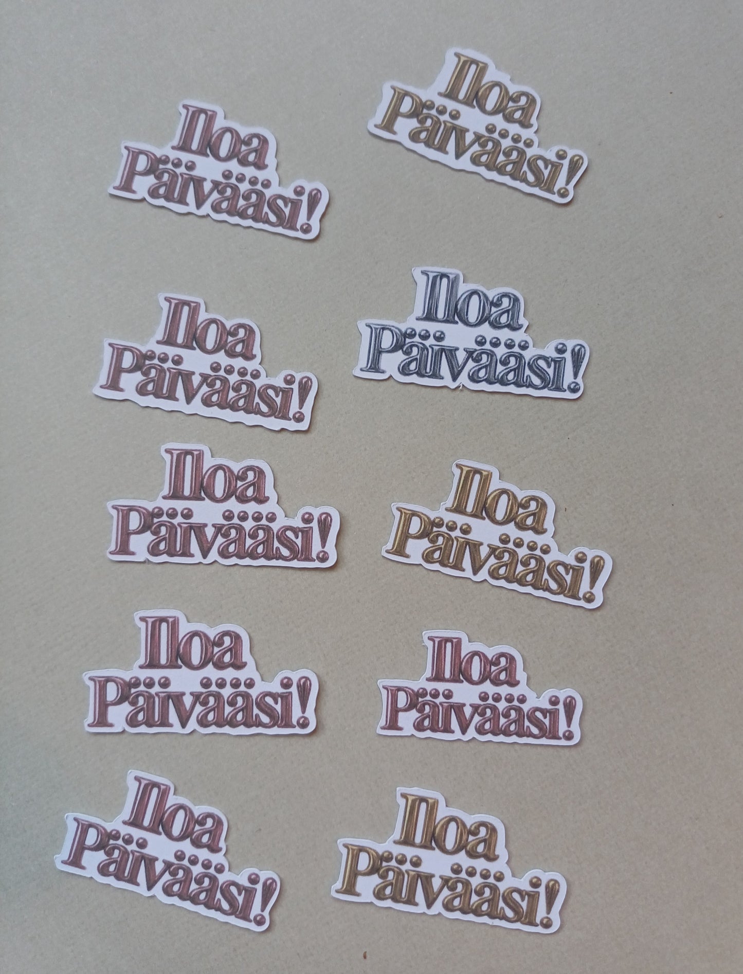 Tekstileike Iloa päivääsi! Eri värejä. Yhteensä 10kpl.